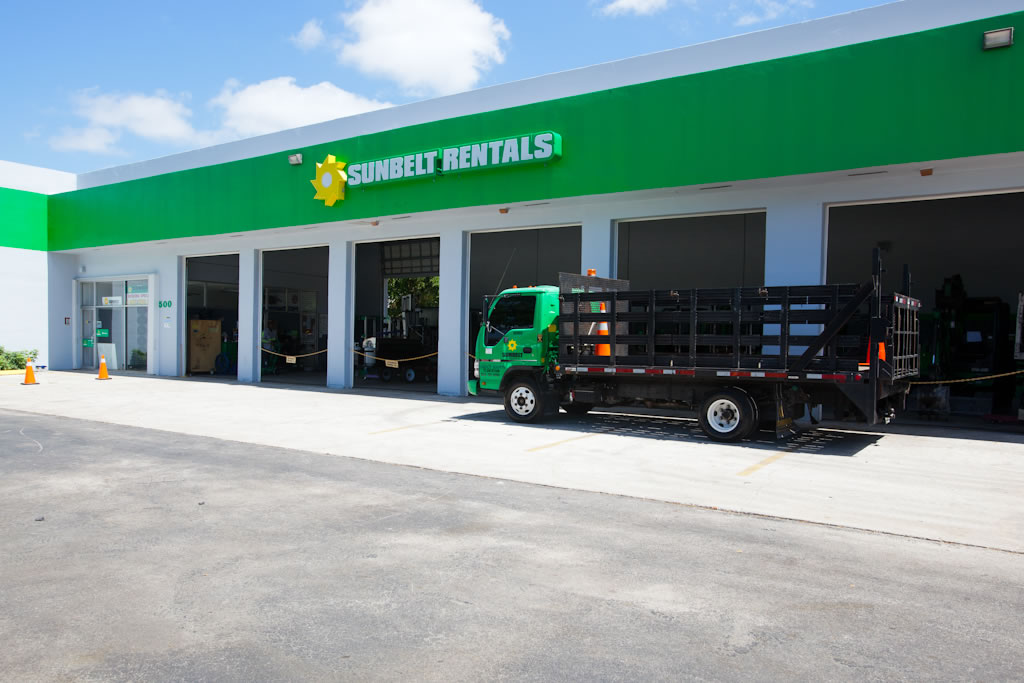 Side view of Sunbelt Rentals with a truck standing infront