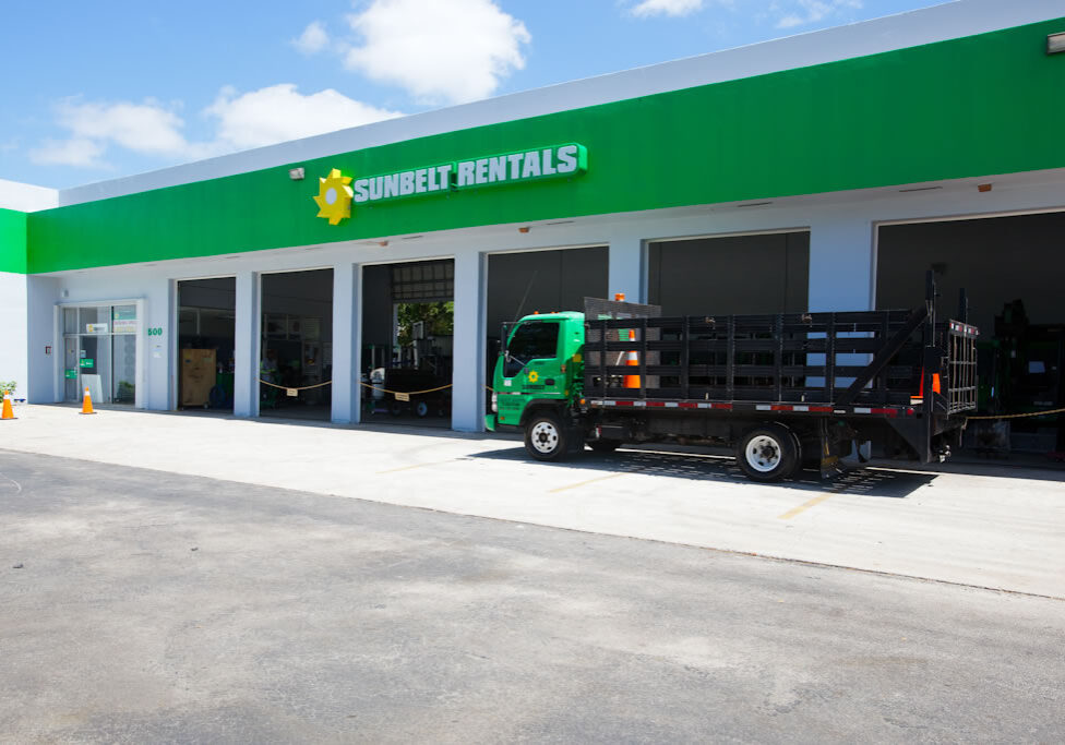 Side view of Sunbelt Rentals with a truck standing infront
